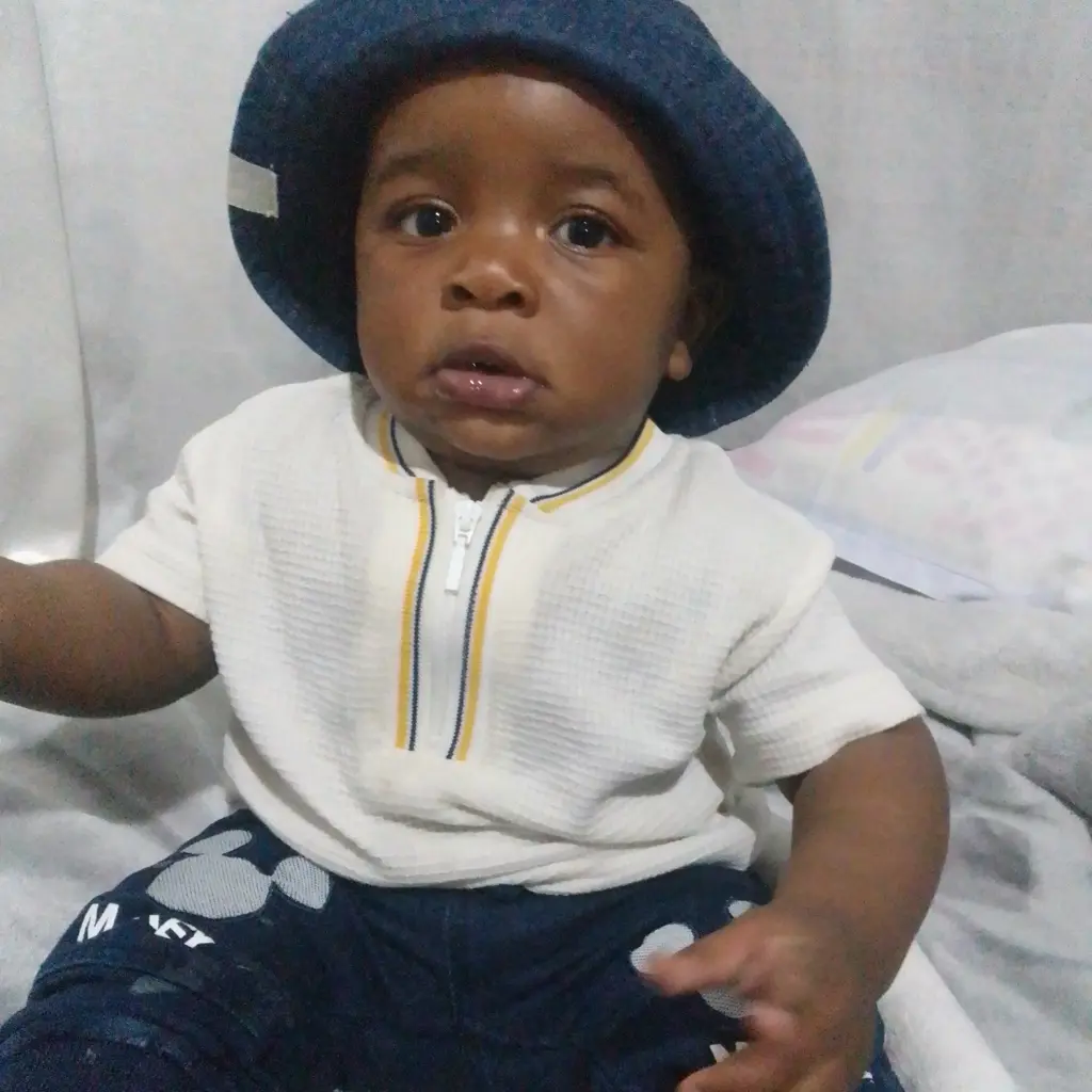 Troy Elon  Madzikova